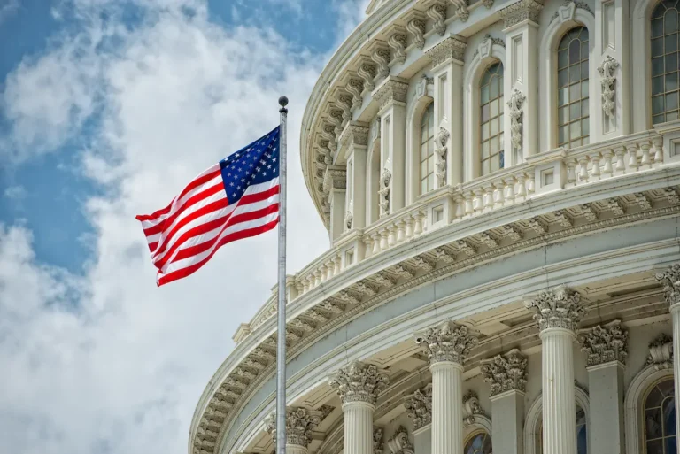 US Capitol building with American flag highlighting security for government facilities and advanced government locksmith services